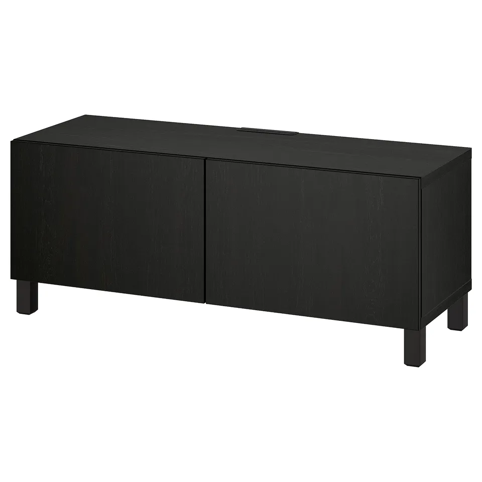 A black BESTÅ tv bench with two closed doors, a rectangular shape, simple design, and adjustable shelves inside.
