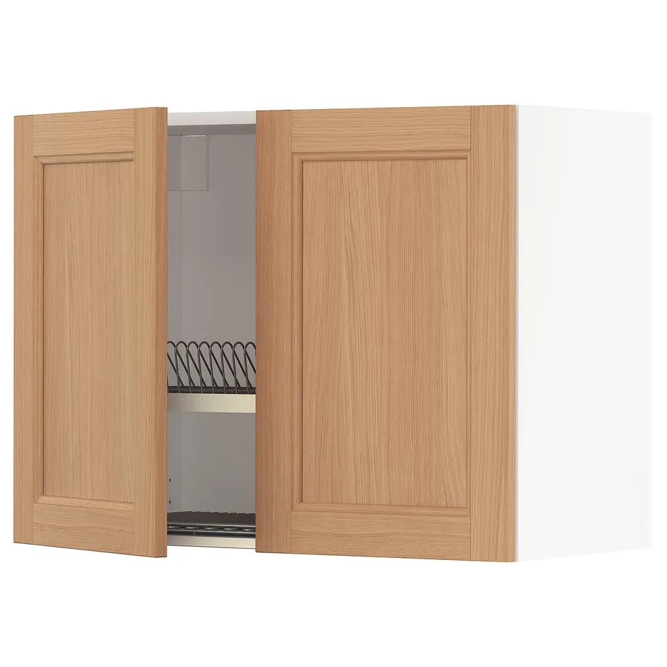 A wall-mounted kitchen cabinet named METOD with oak doors and a steel dish drainer inside.