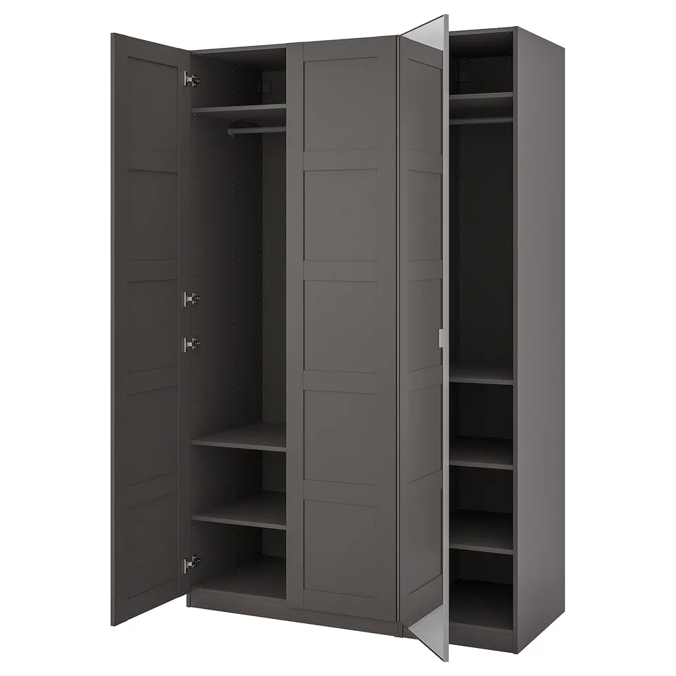 This image an open PAX wardrobe in dark grey. It has multiple shelves and compartments for storage.