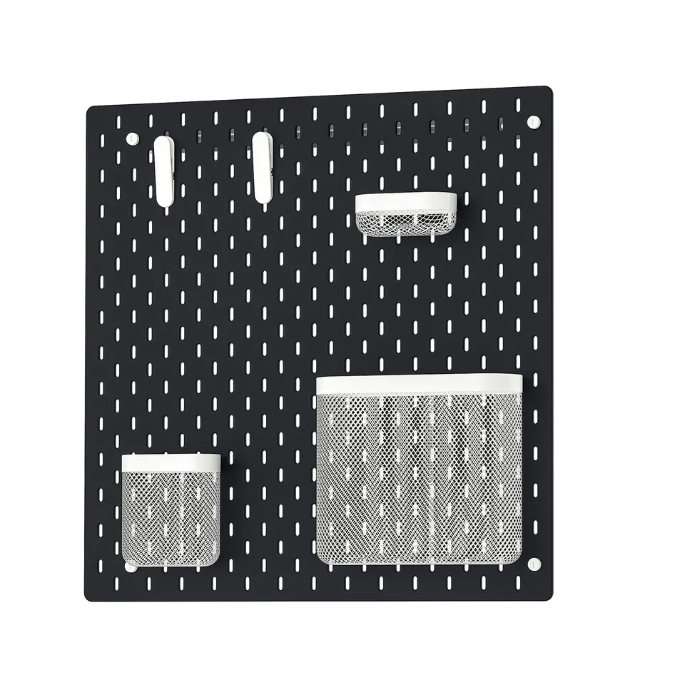 SKÅDIS black pegboard with white accessories: baskets, clips, organised.