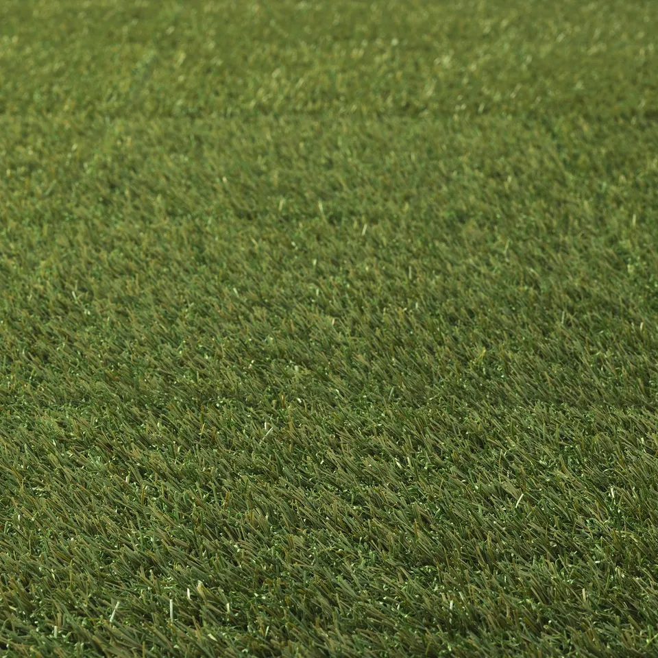 Close-up of vibrant, lush artificial grass, soft and evenly cut.