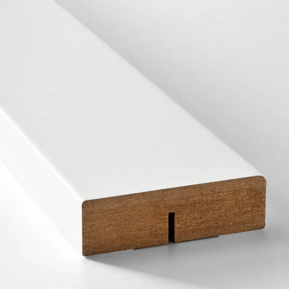 Close-up of brown FÖRBÄTTRA wall panel, smooth textured, mounted on white surface.