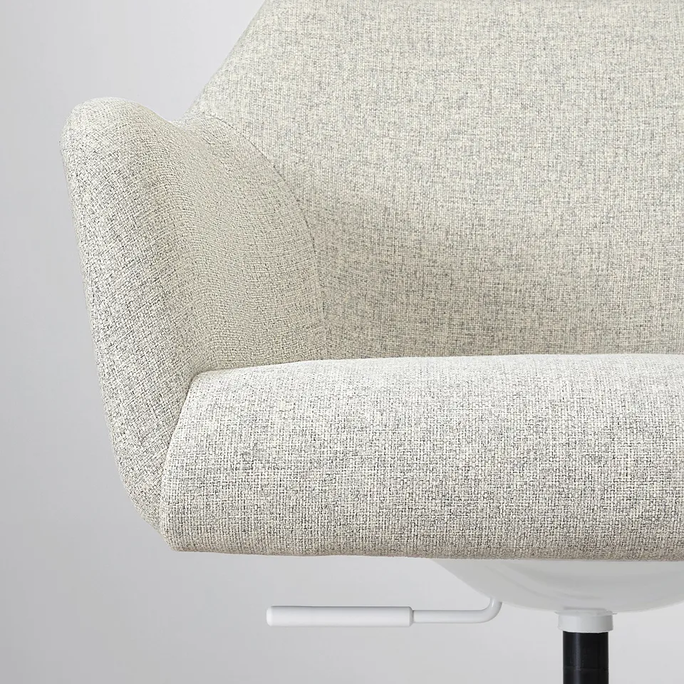 Close-up of TOSSBERG chairs padded seat and backrest, showcasing soft, durable fabric and comfortable design.