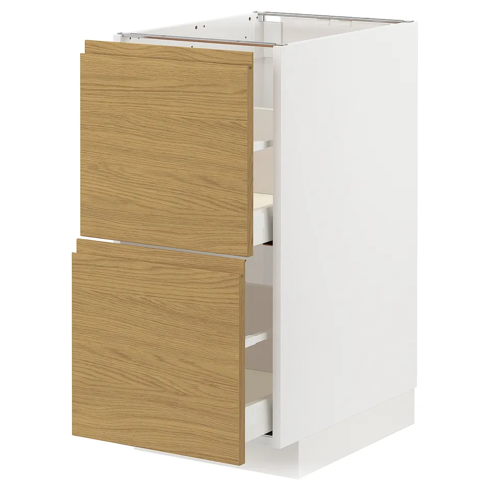 White kitchen cabinet with oak wooden drawers, modern minimalist design.