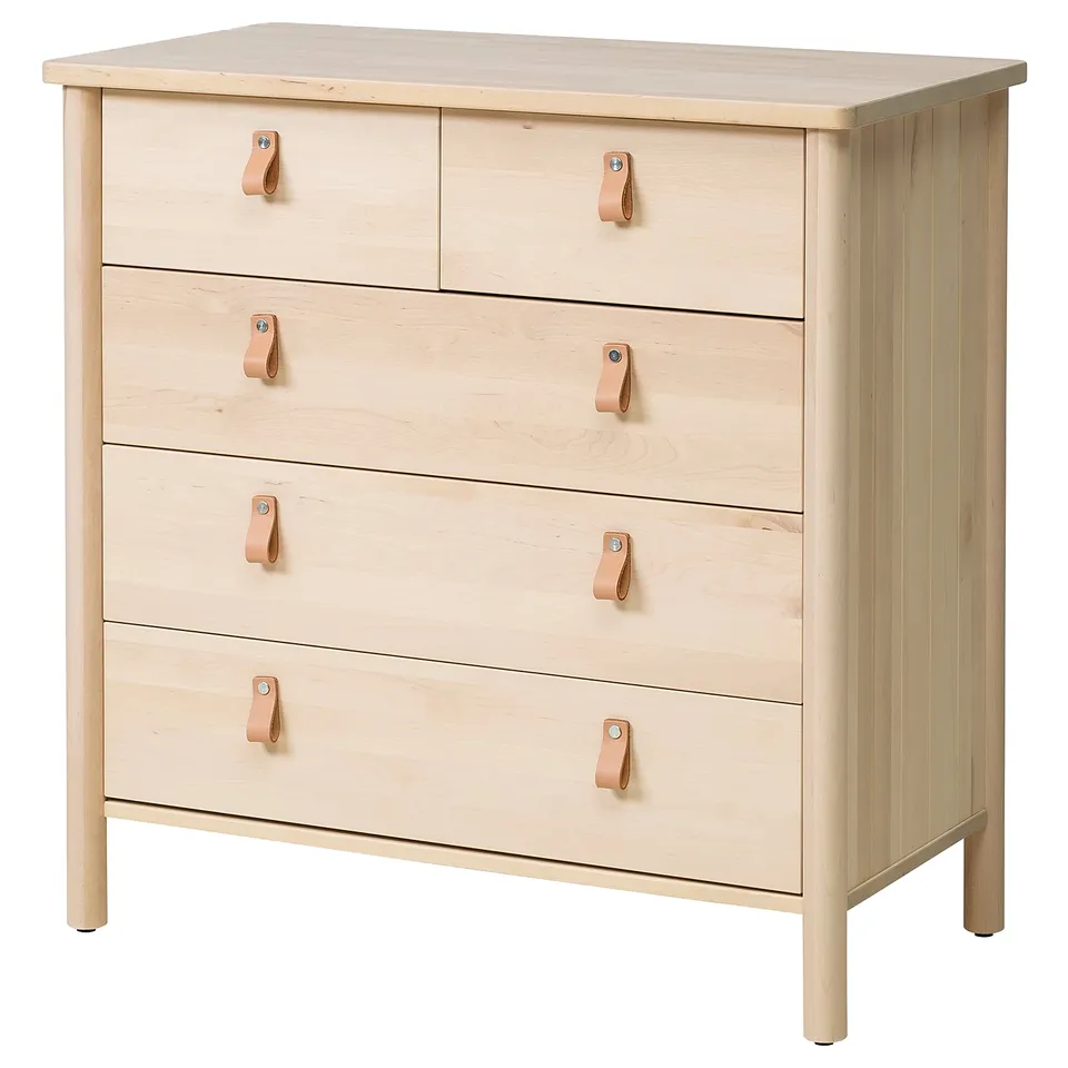 Light wood BJÖRKSNÄS chest, 6 drawers with leather handles, sleek design.