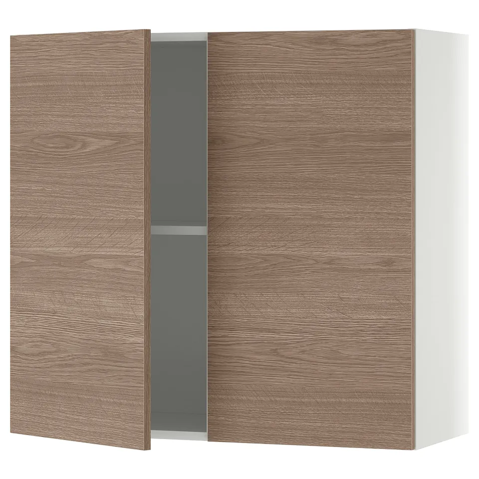 A KNOXHULT wooden wall cabinet in a light brown colour with one grey shelf, designed for kitchen storage.