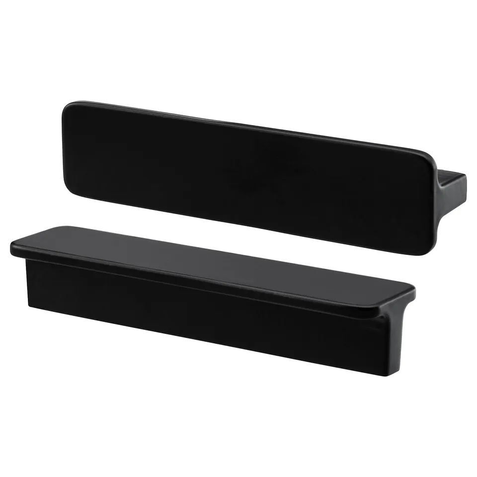 Two sleek black HACKÅS handles, made of powder-coated aluminium, rectangular with smooth edges.