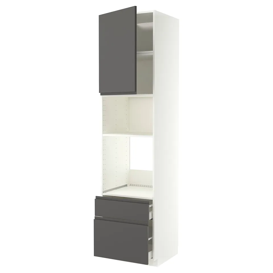 An IKEA METOD kitchen unit with dark grey voxtorp fronts, including an open cabinet and drawers, set against a white background.