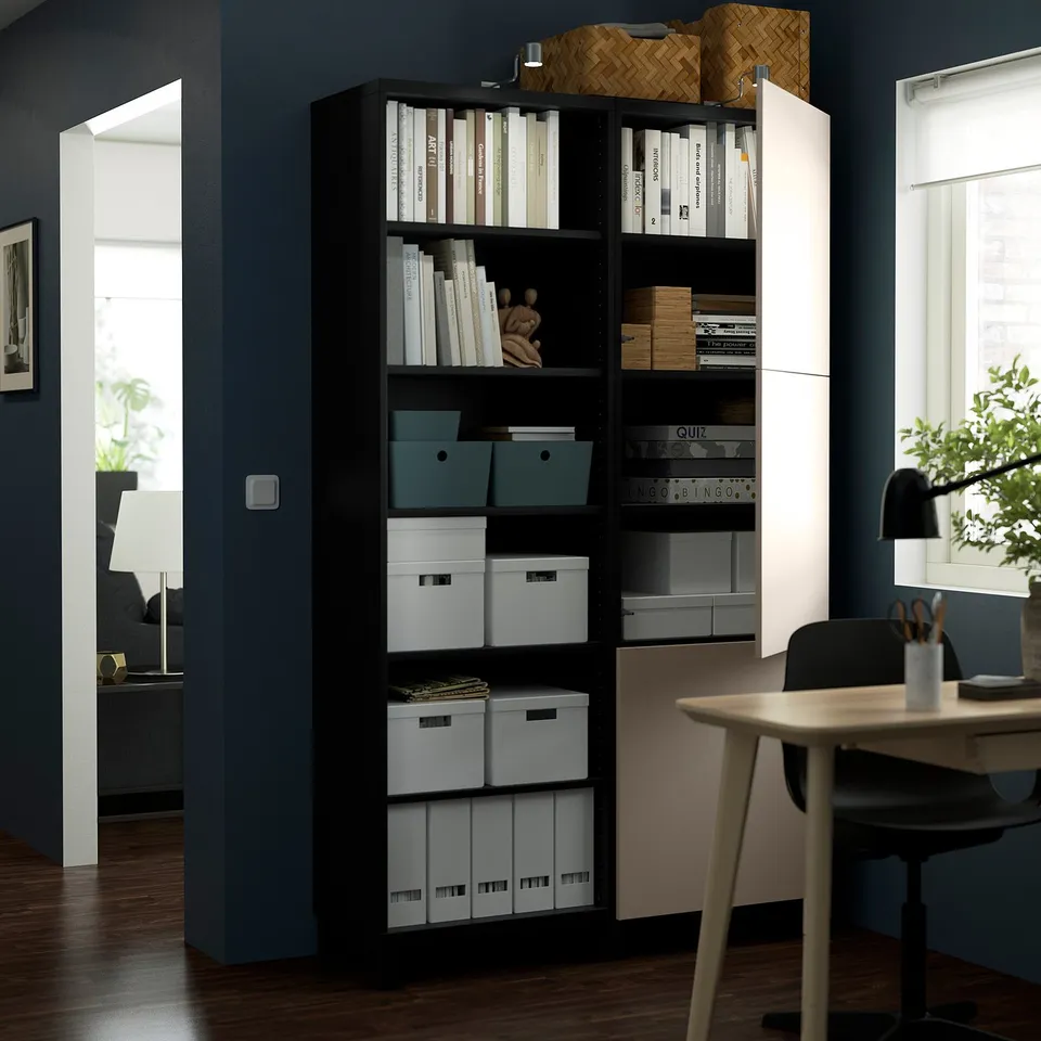 Modern office with BESTÅ storage unit, adjustable shelves, and workspace.