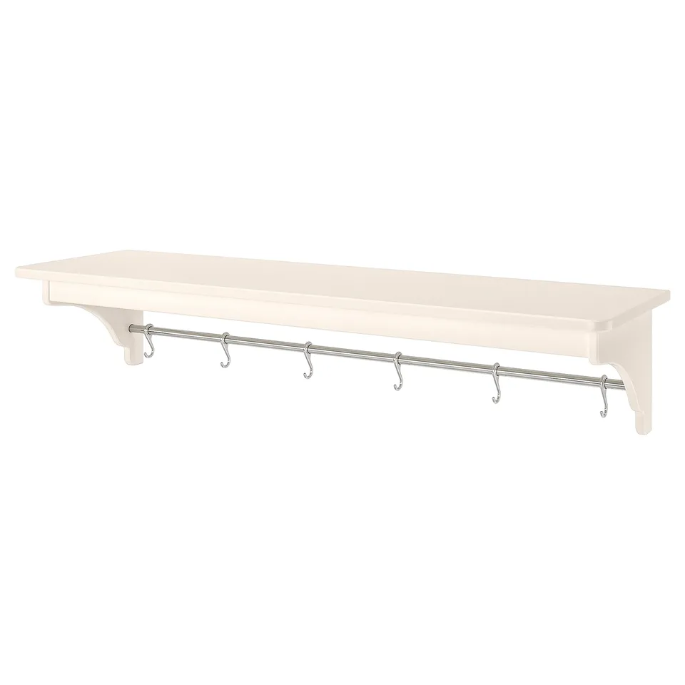 A TORNVIKEN white wall shelf with five metal hooks for hanging items, designed to save space and organise kitchen essentials.