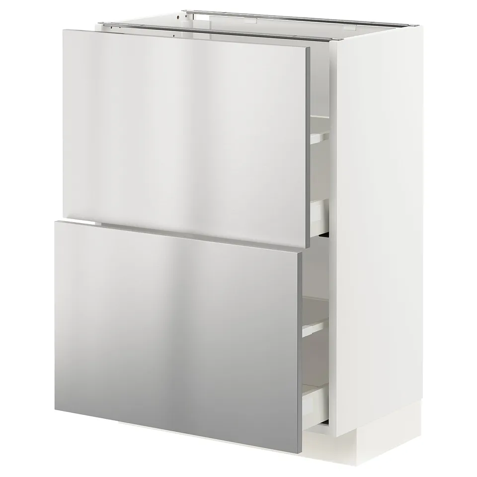A white METOD kitchen cabinet with a stainless steel finish and multiple drawers. It has a modern design with self-closing drawers and a sturdy frame.