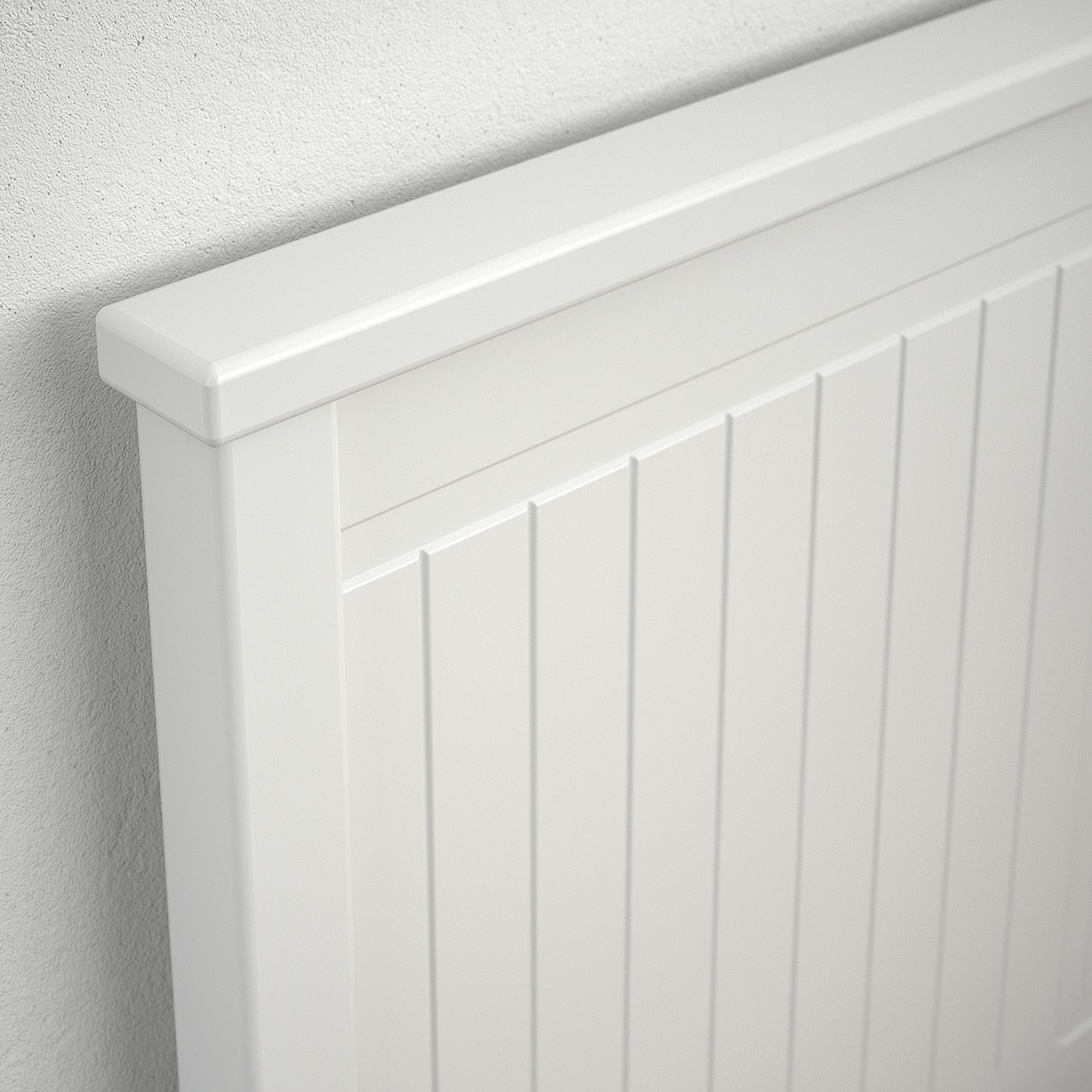Close-up of high-quality white bevelled wooden panel; smooth finish, sturdy construction.