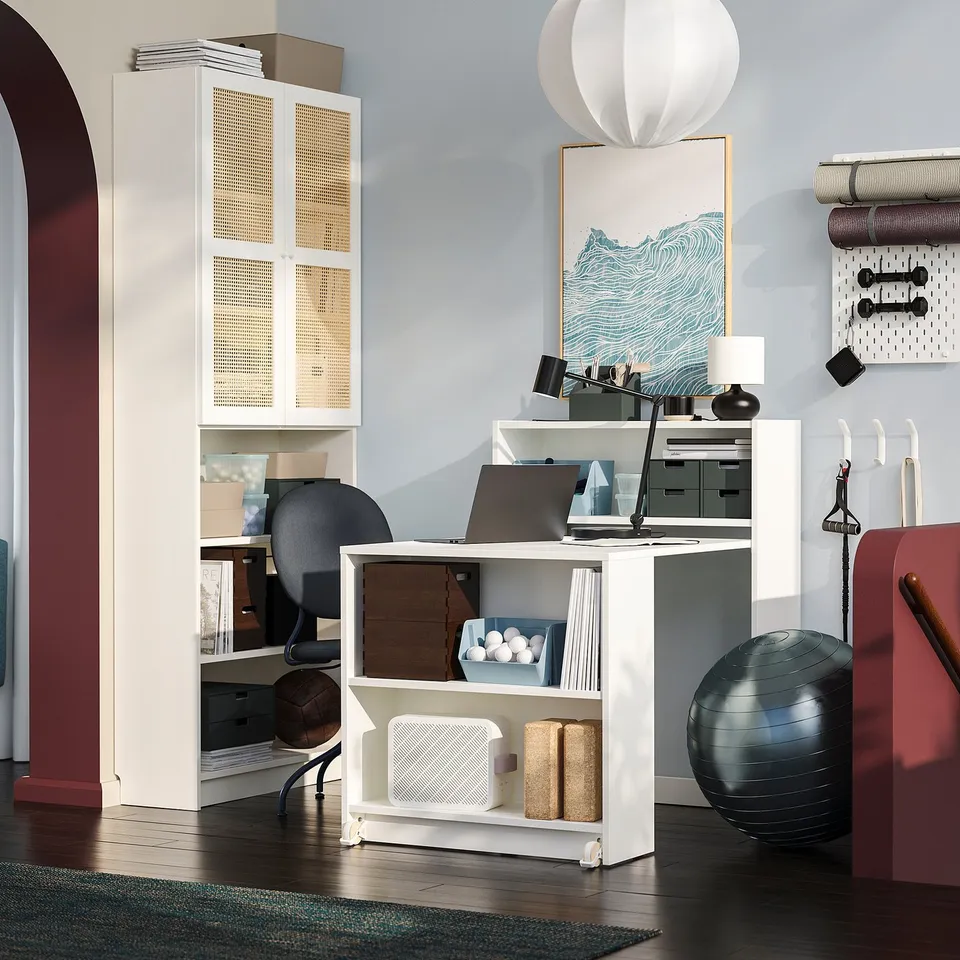 BILLY bookcase with foldable table, open/closed storage, computer setup, modern home office.