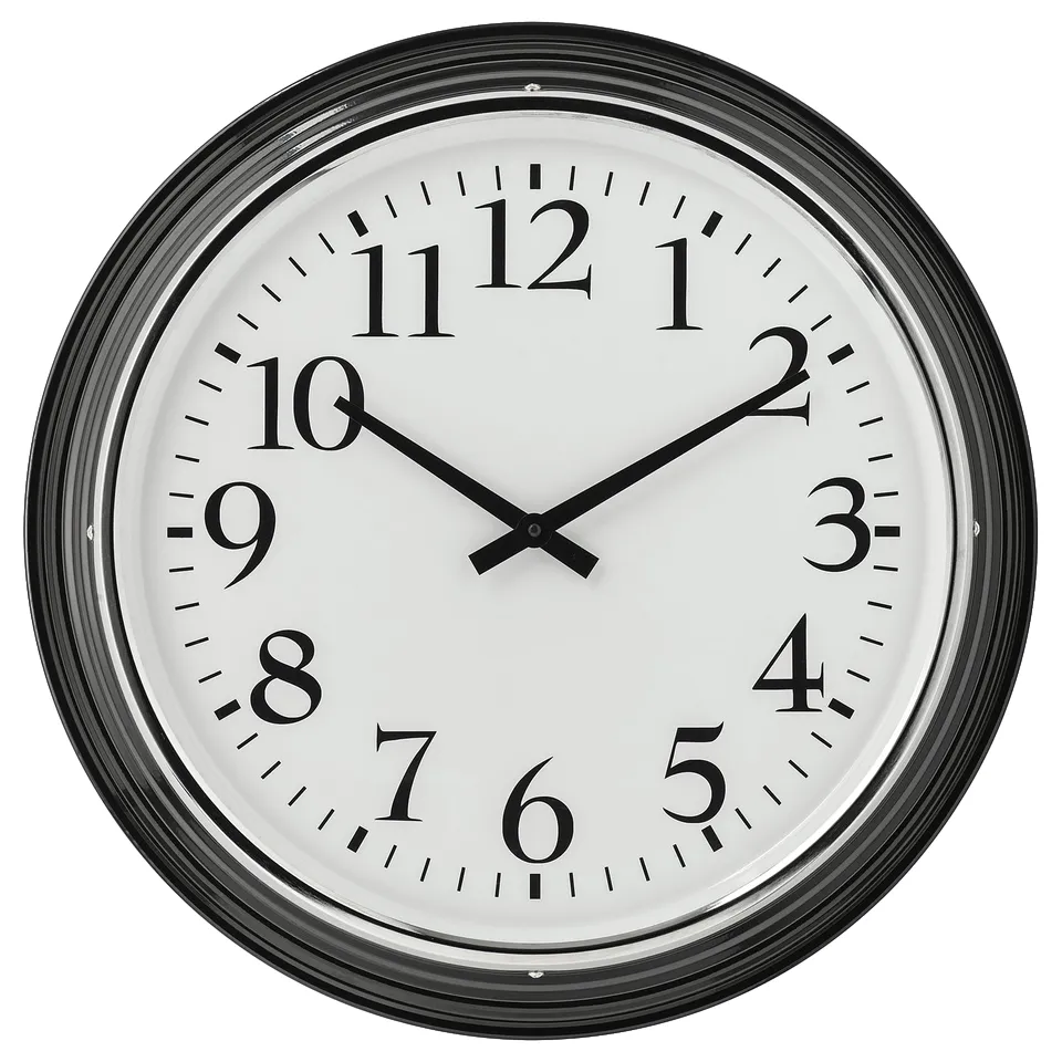 A BRAVUR clock. It is black and white, round, with black numbers and hands on a white face. Silent quartz mechanism.