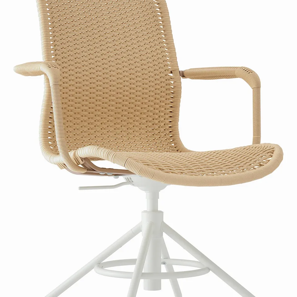 A woven paper chair with armrests, adjustable height and rounded back support for comfort.