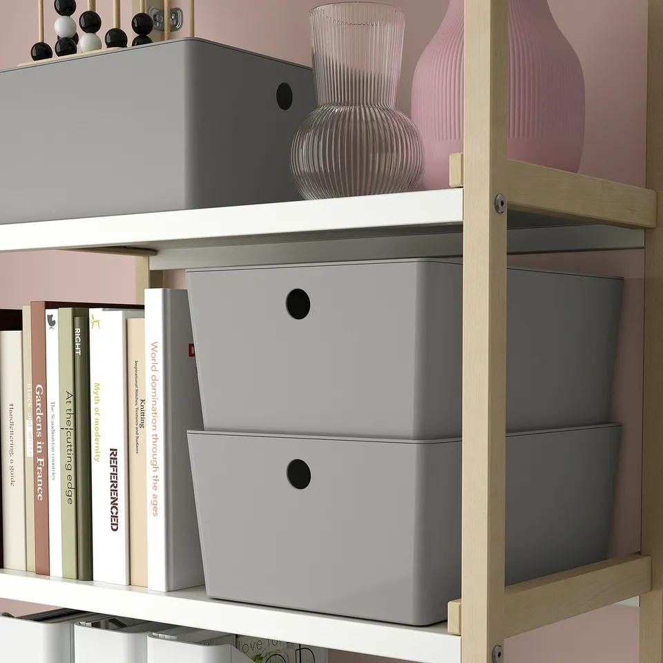 Books and storage boxes on shelves.