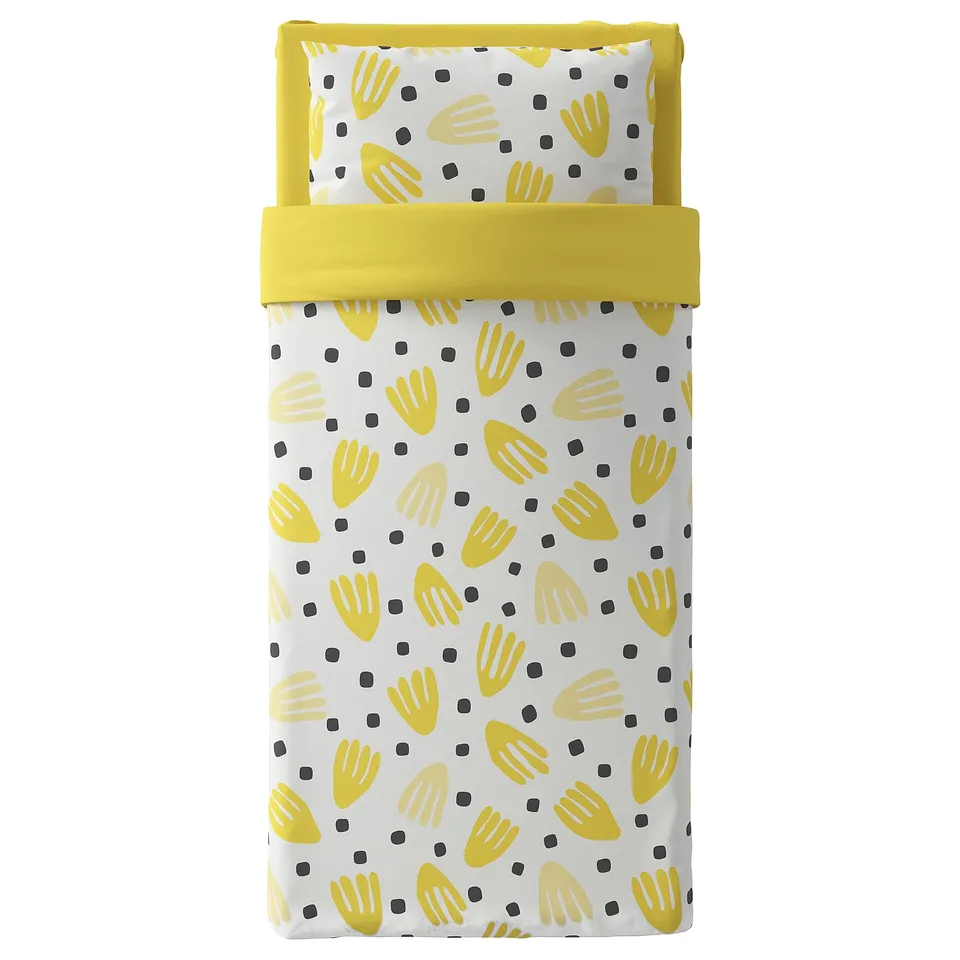 BRUKSVARA bedset: yellow, white, recycled polyester, hand prints, black dots.