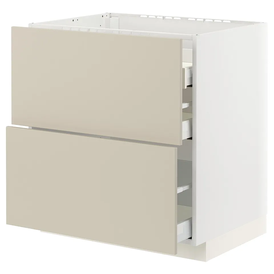 Displays a beige METOD kitchen cabinet with two full-extension drawers, featuring a sleek and modern design.