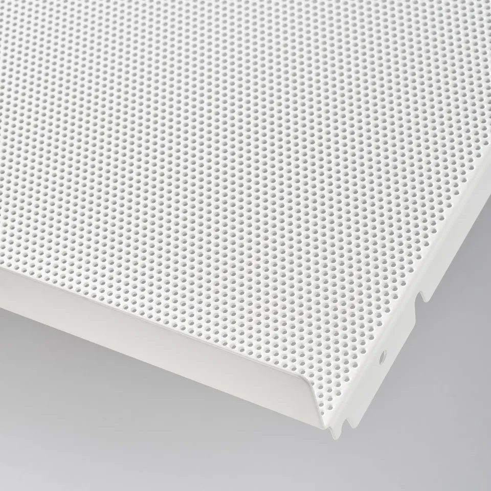 White perforated metal shelf, durable, easy to clean, designed for storage organisation.