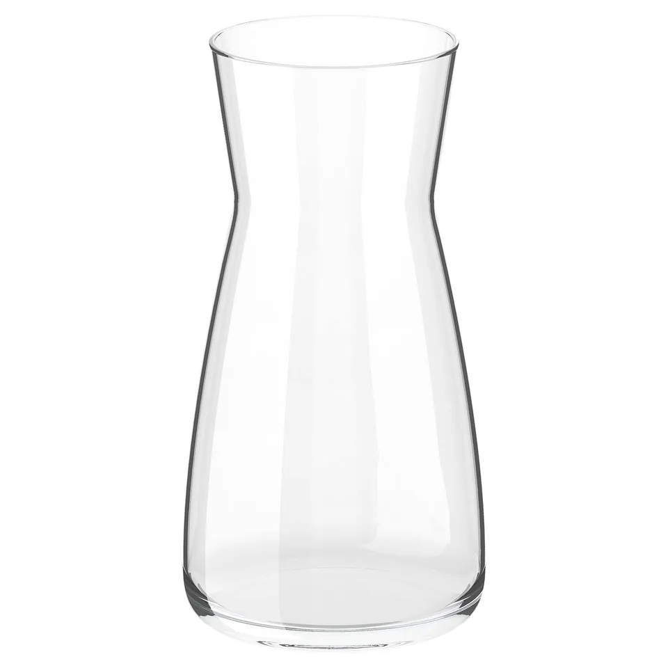 Clear glass vase, simple design, suitable for both drinks and flowers.