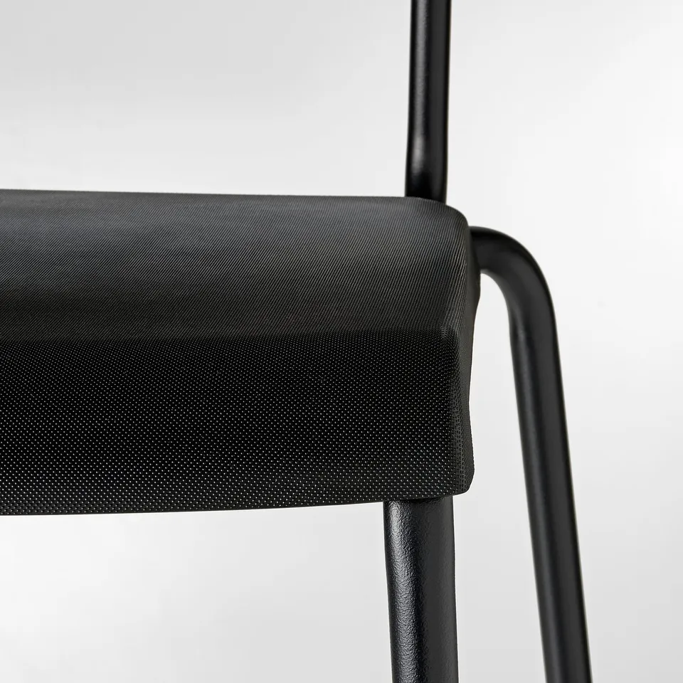 Black modern bar stool with sleek, curved metal arms and a padded seat.