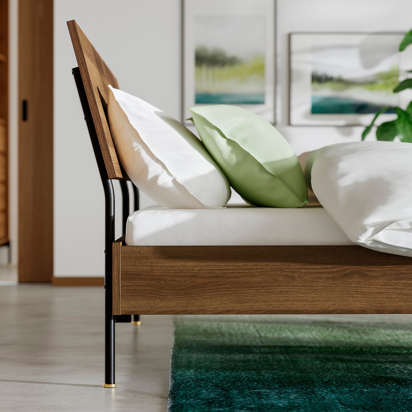 Walnut bed frame with slats, sloped headboard, recessed legs, green rug.