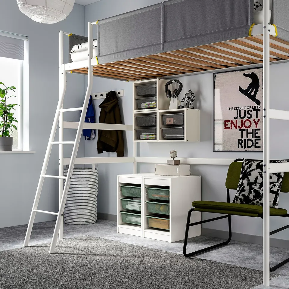 Modern bedroom with TROFAST bunk bed, desk, and ample storage. Natural light enhances the bright, spacious feel.