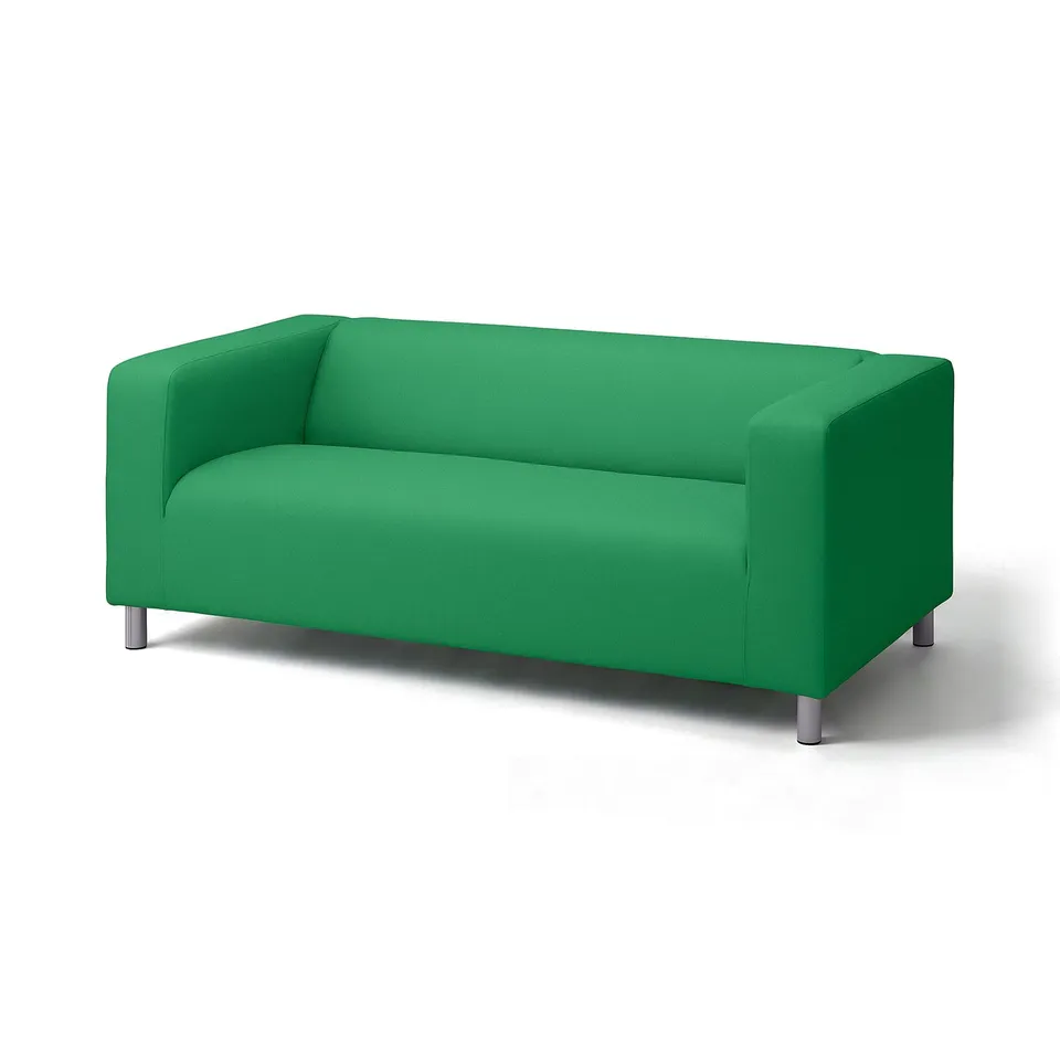 Bright green modern sofa, sleek design, four metal legs, comfortable fabric cover.
