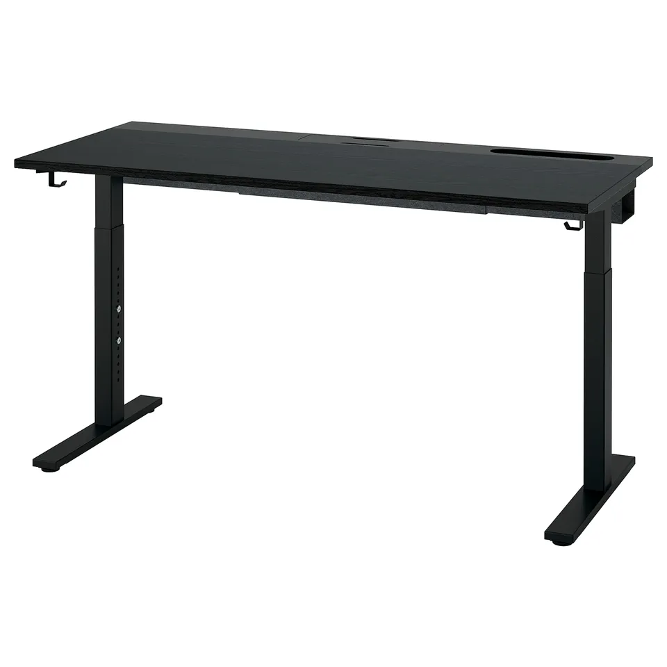 MITTZON: black adjustable desk with metal legs, cable slots, two hooks. Modern, functional design.