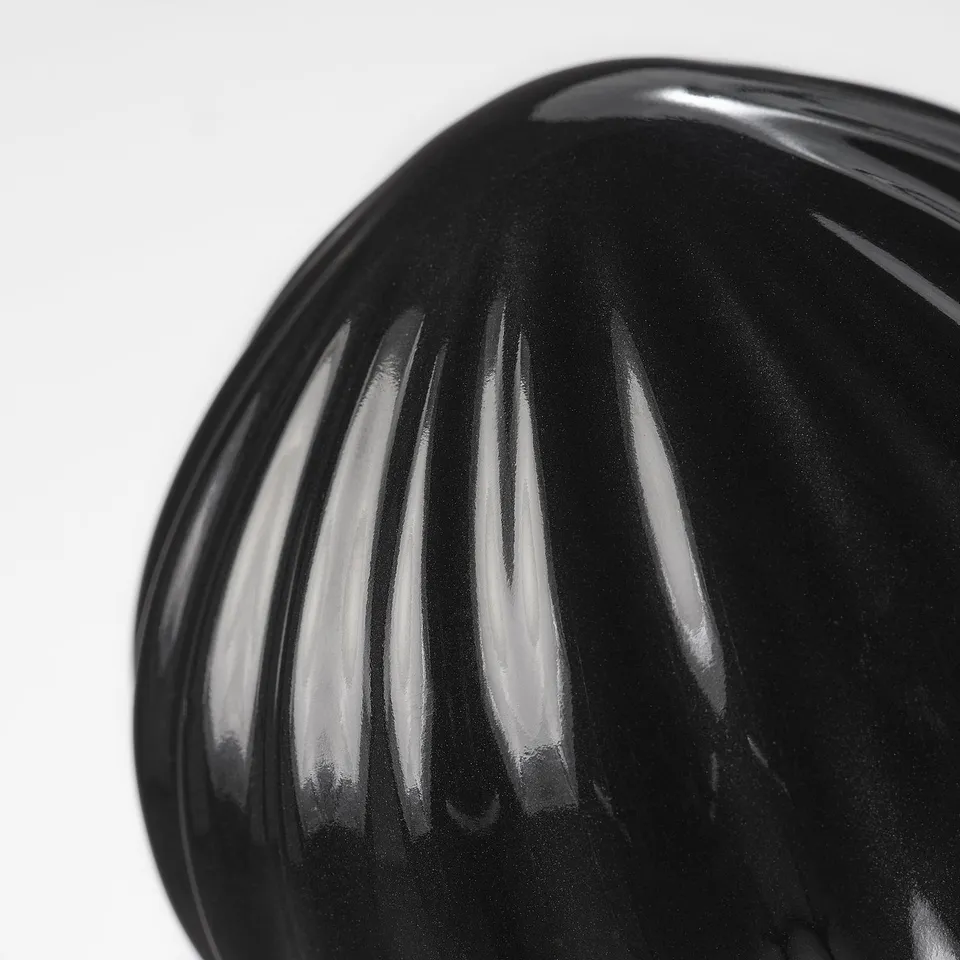Glass finial with vertical ridges, smooth black finish. Elegant and high-quality.
