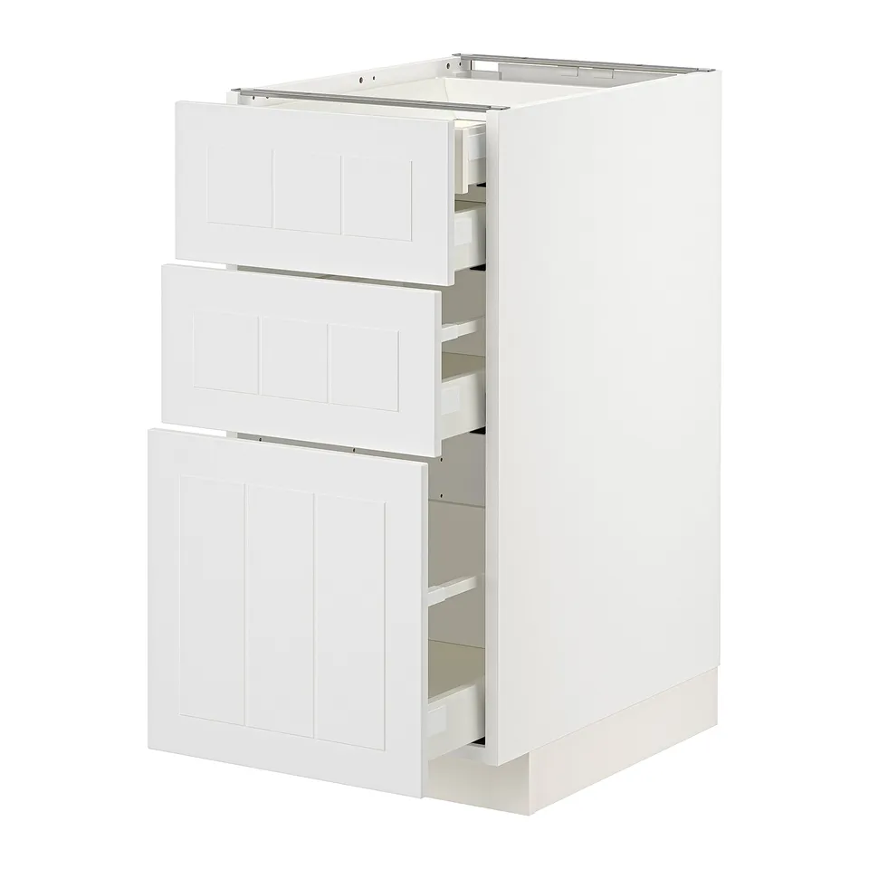 White METOD kitchen cabinet with three drawers and two doors.