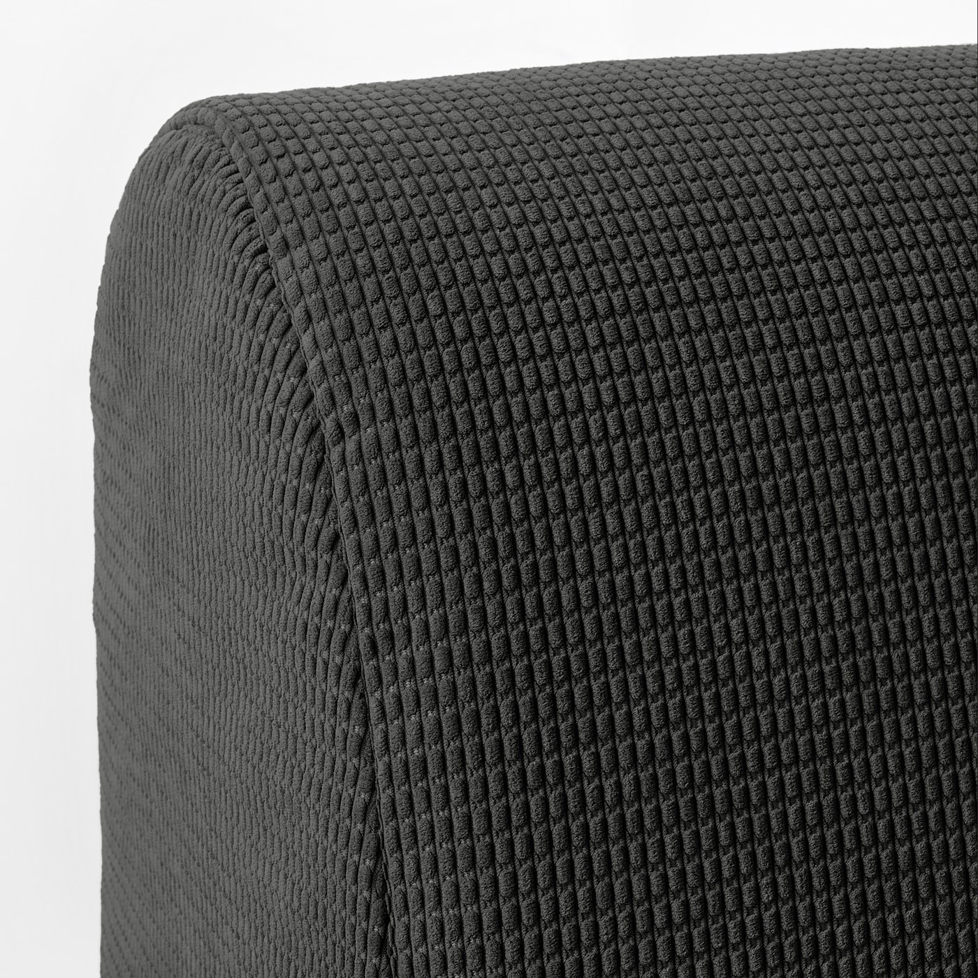 Close-up of LYCKSELE MURBOs textured, dark grey, knitted sofa cover, highlighting its thick, quilted pattern and soft, cosy material.