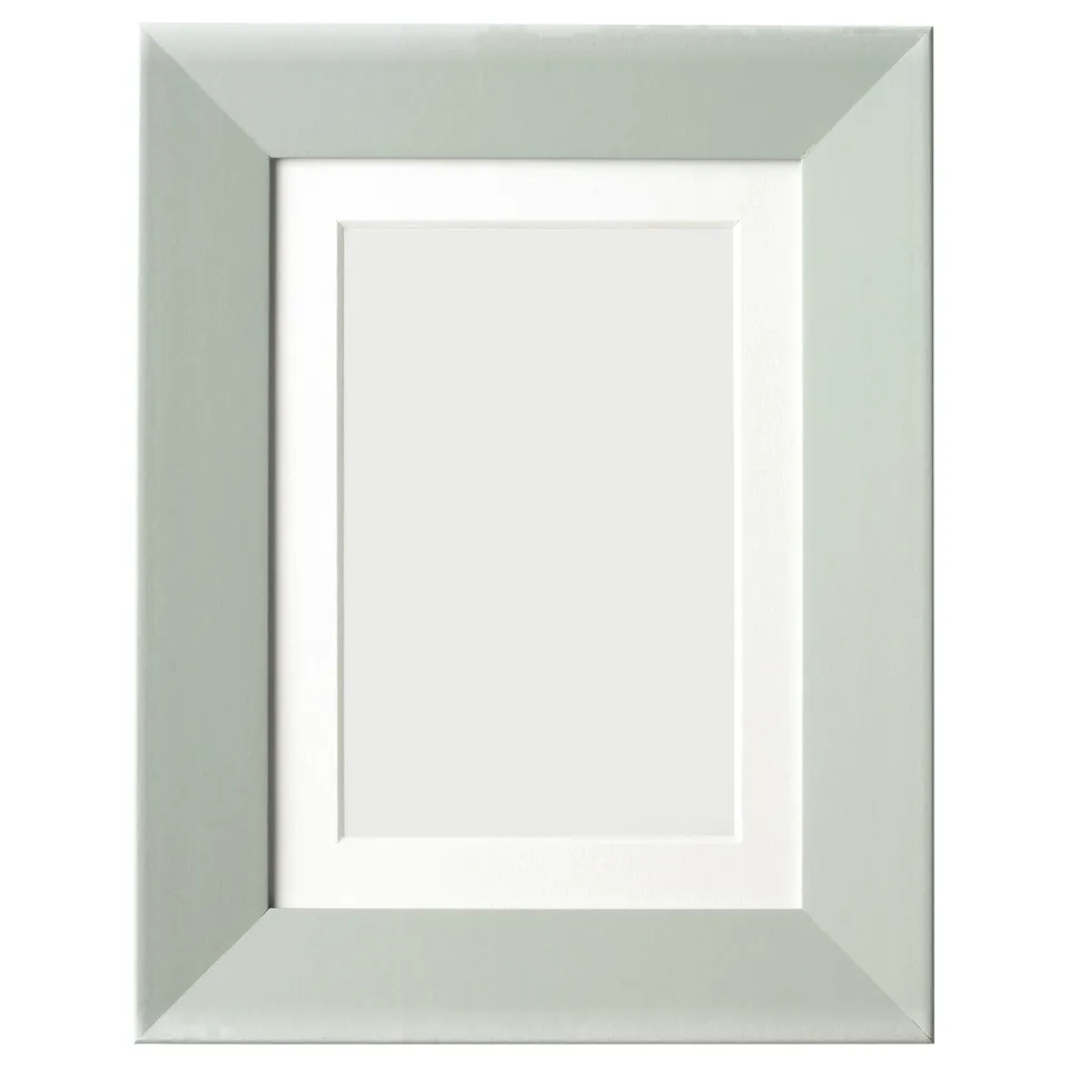 Greenish picture frame with white inset, slightly wide, sturdy design.