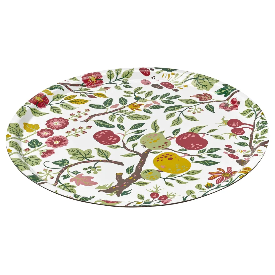 Round tray named HAVSBRAXEN with floral pattern, white background, colourful fruits, and leaves, made of high-pressure melamine laminate.