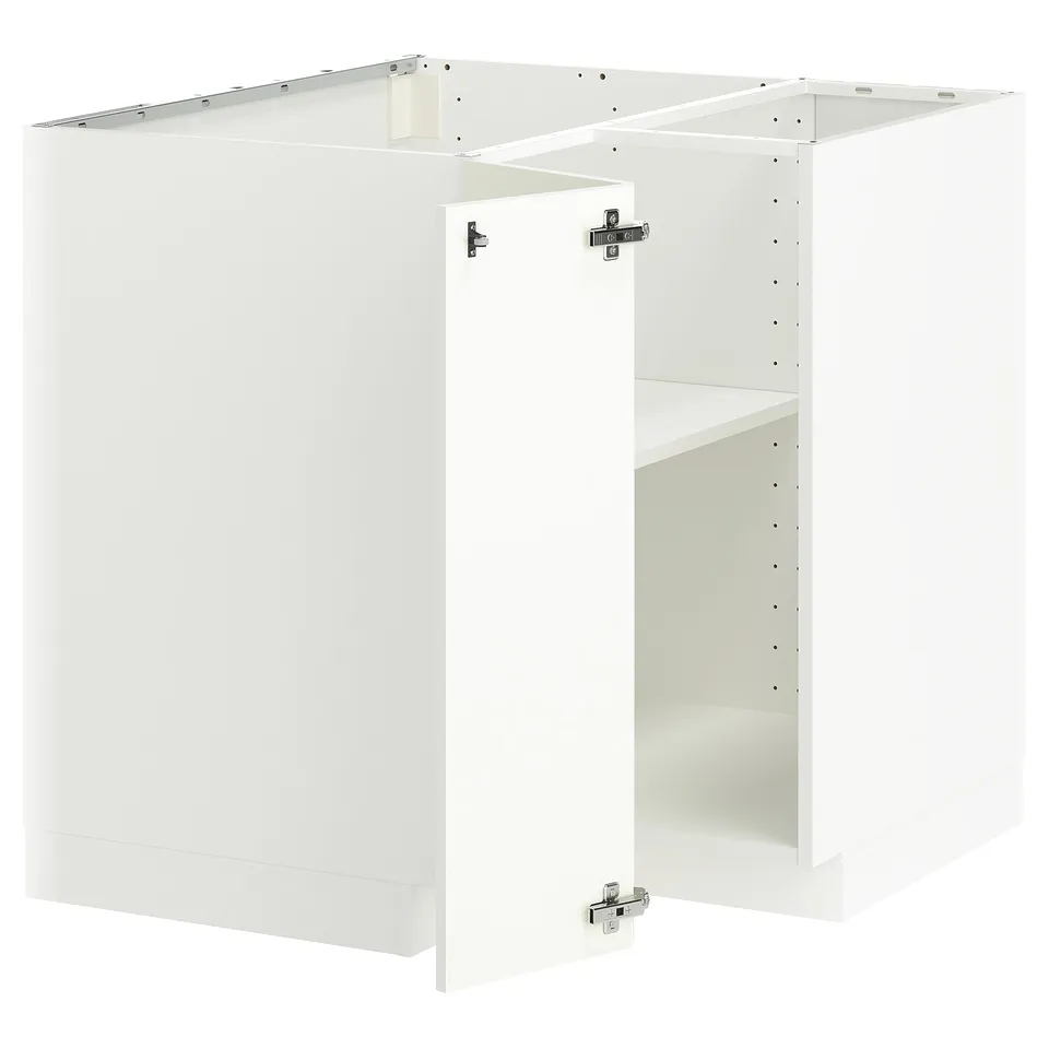 A white METOD kitchen corner base cabinet set. It a sturdy frame with adjustable shelves and reversible doors.