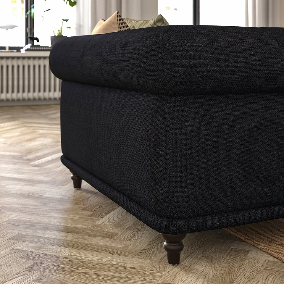 Dark grey VISKAFORS sofa, classic design with rolled arms, soft cushions, wooden legs.