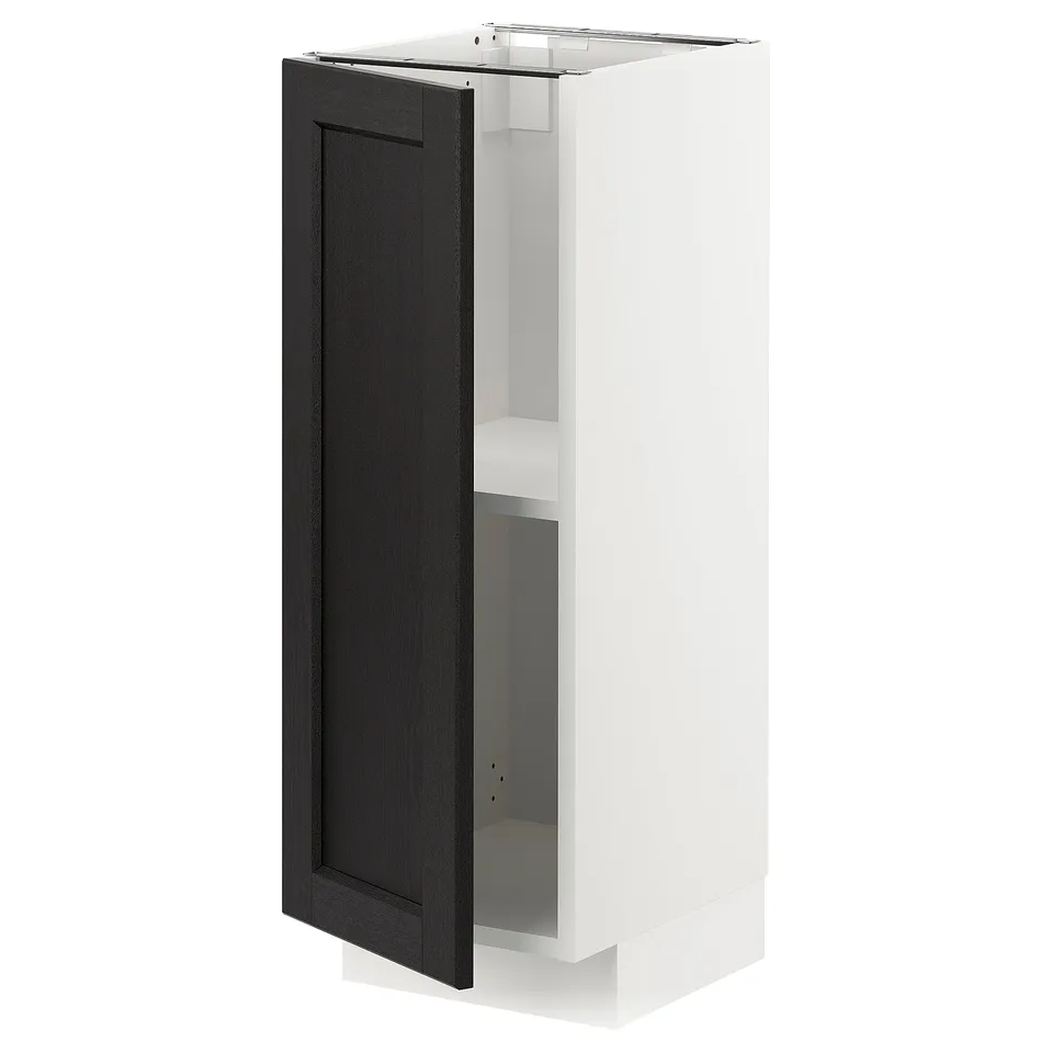 Modern white METOD cabinet with black door, bevelled edges, adjustable shelf.