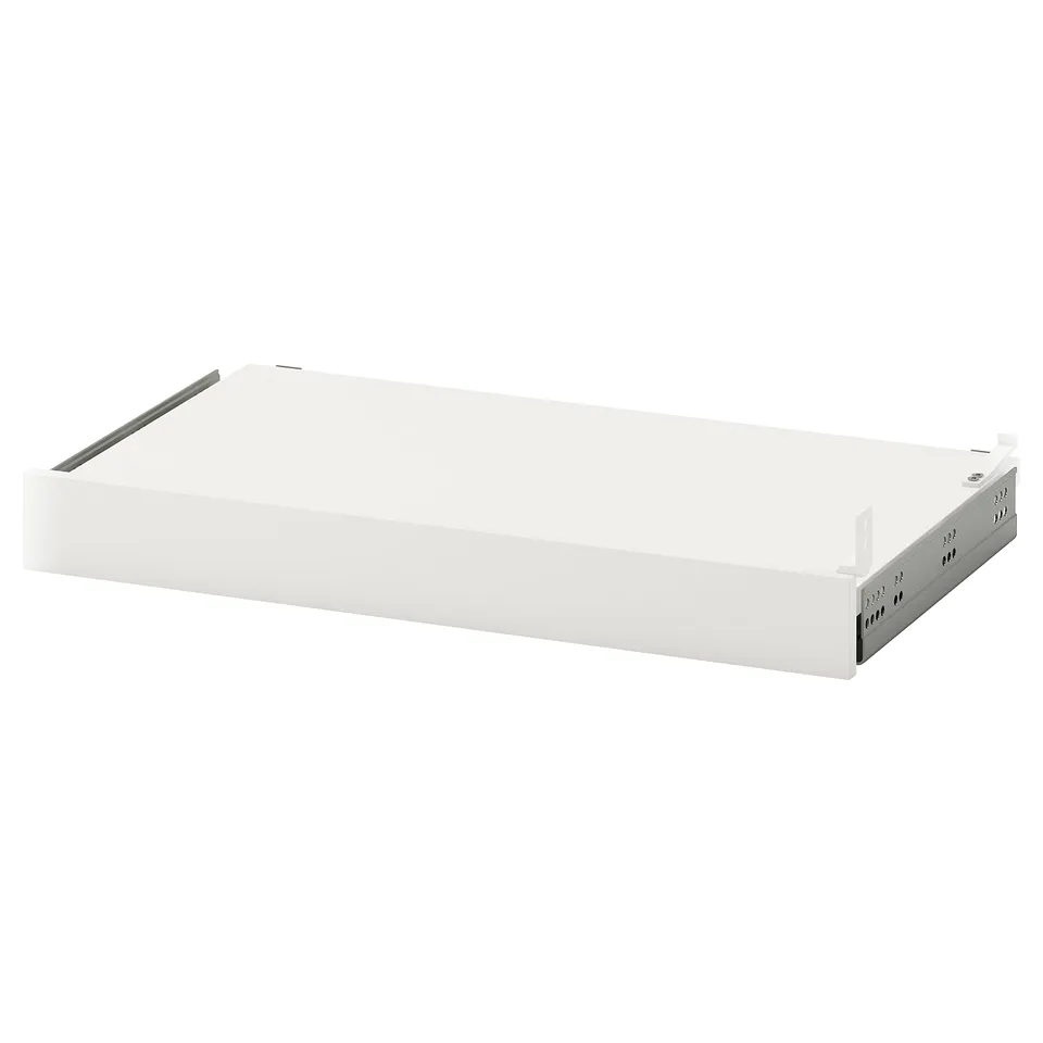 A white UTRUSTA pull-out shelf with galvanised steel runners, designed for kitchen storage.