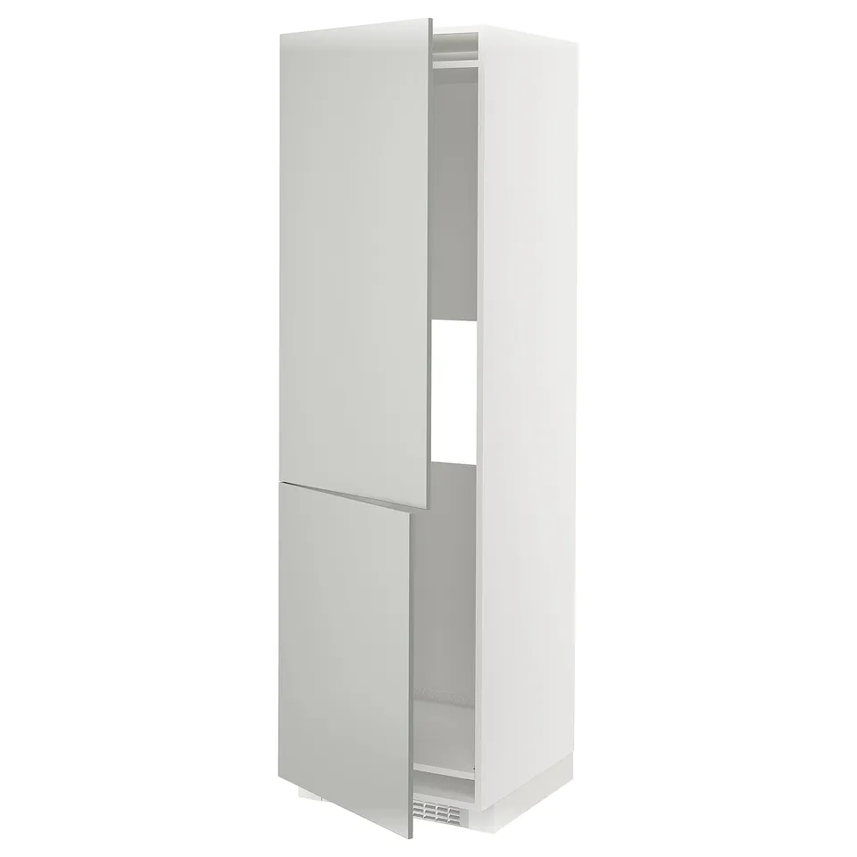 Displays a white ikea METOD tall kitchen cabinet with light grey havstorp doors, featuring a modern minimalist design with clean lines.