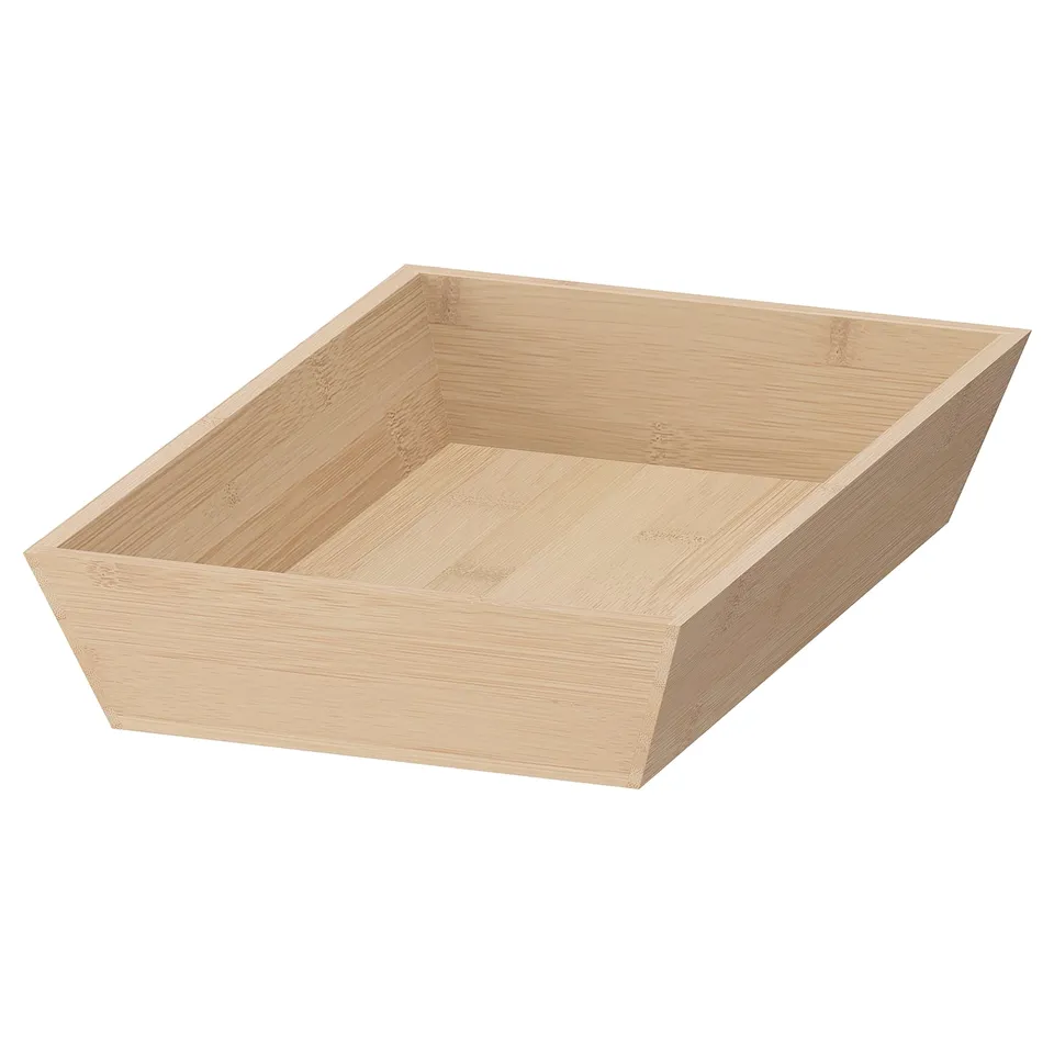 Bamboo cutlery tray by IKEA, light brown, keeps utensils neat.