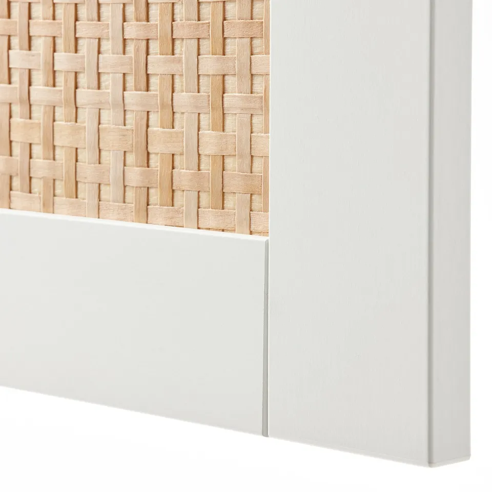 White wicker drawer with smooth edges, part of a modern furniture set.