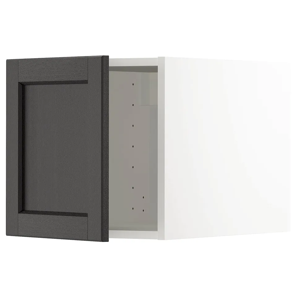 A METOD kitchen cabinet with a black-stained wooden door featuring bevelled edges and a recessed panel design.