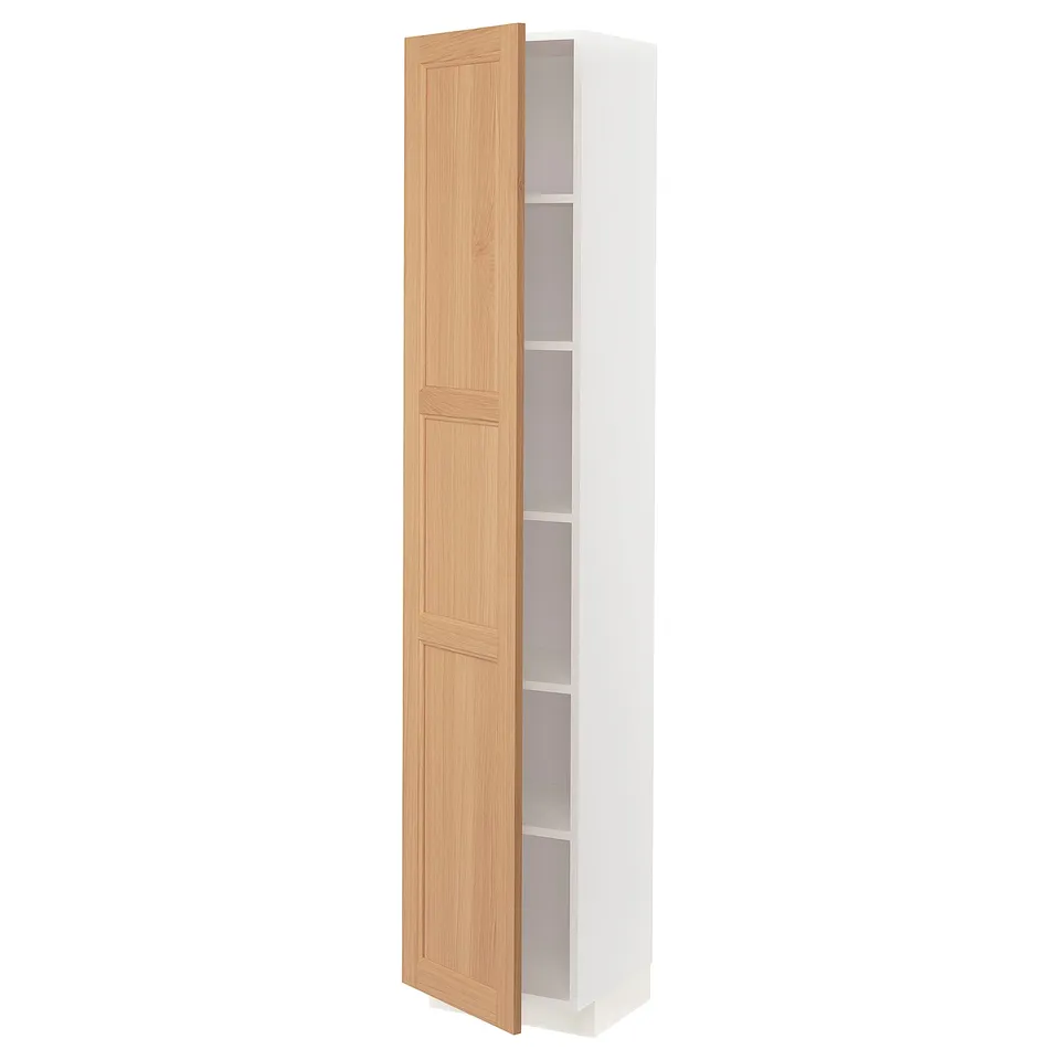 A white and light wood ikea METOD tall cabinet with adjustable shelves and a swing door.