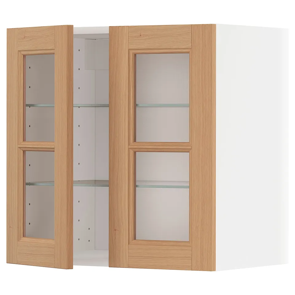 Ikea METOD kitchen cabinet in oak with glass doors.