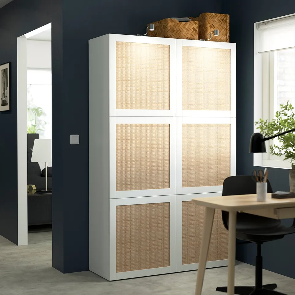 White BESTÅ storage with beige fronts in a home office.