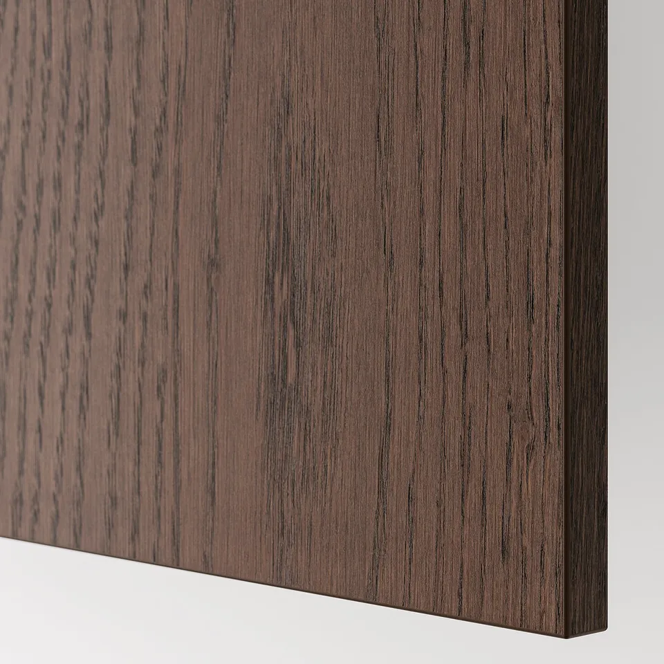 Dark wooden panel detail with visible grain texture, edges smoothly finished.