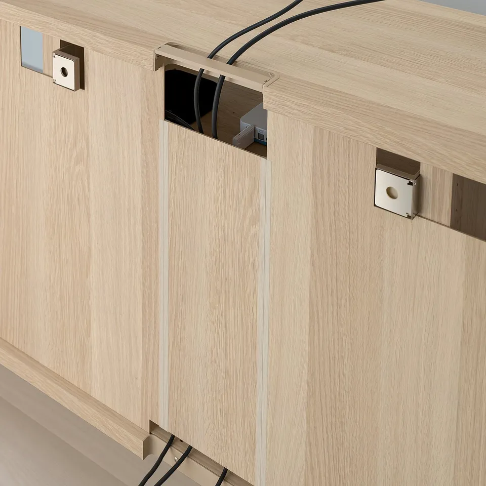 Wooden tv unit with adjustable shelves, cable management, and push-open drawers for organised media storage.