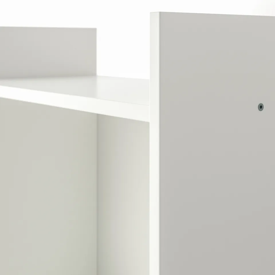 Minimalist white wall shelf, sleek design, shallow depth for efficient wall use.