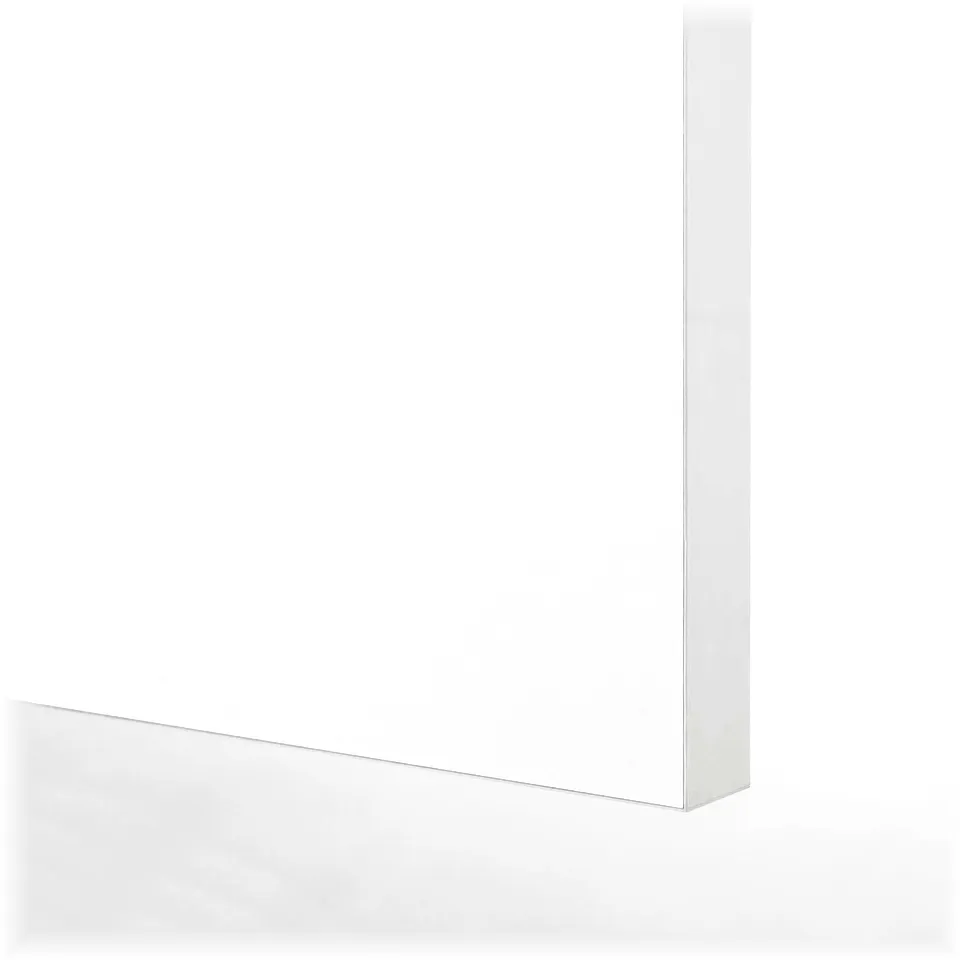 Crisp white kitchen unit with sleek, smooth surfaces; modern, minimalist design.