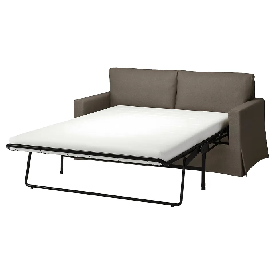 Grey convertible sofa with white mattress, sleek metal legs, modern design.